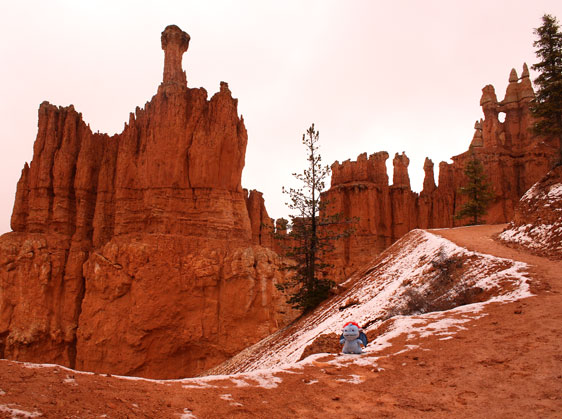Standing with the hoodoos on a relatively dry segment of Peek-A-Boo Loop trail in Bryce Canyon